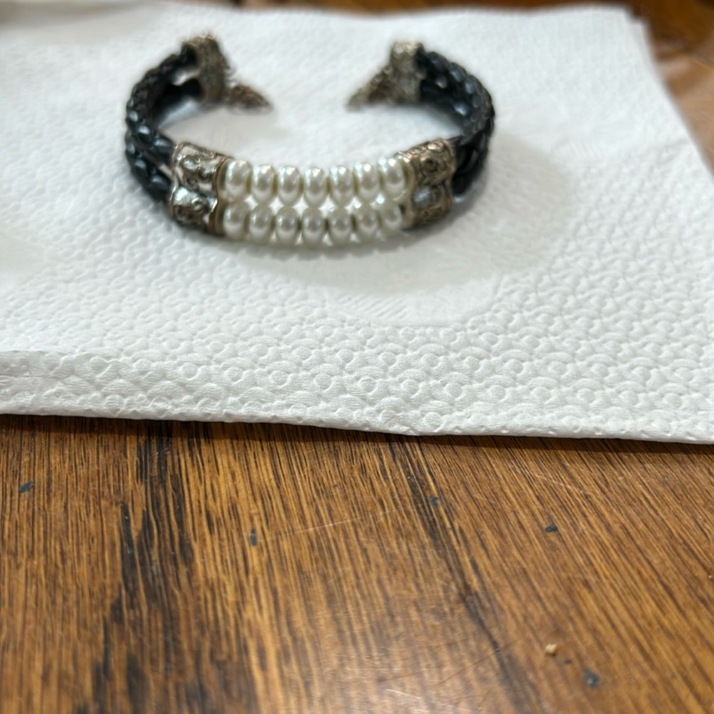 Cuff bracelet with clasp